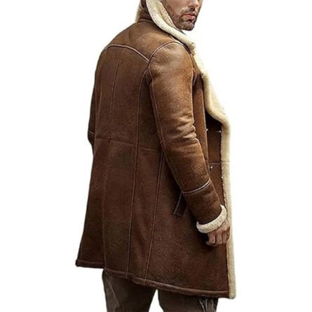 "A rugged yet stylish B3 Bomber Shearling Aviator Coat for Men, crafted from genuine sheepskin leather with a plush shearling lining. Features a high shearling collar, front buckle straps, rib-knit cuffs, and multiple pockets, combining vintage aviator design with modern functionality. Perfect for winter warmth and timeless fashion."