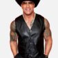 Dwayne Johnson's black leather vest from Men of the Year Party 2024 featuring genuine leather and snap closure for a bold, sleek look.