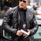 Brown leather jacket inspired by Dwayne Johnson in The Other Guys, featuring a ribbed -style collar, zipper closure, and flap chest pockets.