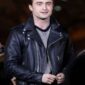 Daniel Radcliffe-inspired black biker leather jacket featuring real leather, asymmetrical zipper closure, snap-tab collar, and quilted shoulder design.