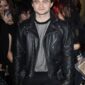 Daniel Radcliffe-inspired black biker leather jacket featuring real leather, asymmetrical zipper closure, snap-tab collar, and quilted shoulder design.