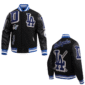 Magic Johnson wearing a black varsity jacket with a black wool body and black leather sleeves,