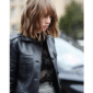 Stranger Things-inspired black real leather coat worn by Maya Hawke with button closure and flap pockets.