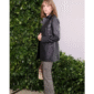 Stranger Things-inspired black real leather coat worn by Maya Hawke with button closure and flap pockets.